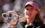 Russia's Mirra Andreeva holds the trophy after winning the French Open tennis tournament women's singles final match against Poland's Maja Chwalinska on day 14 of the French Open tennis tournament on Court Philippe-Chatrier at the Roland-Garros Complex in Paris on June 6, 2026. (Photo by Thomas Samson / AFP)
 