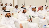 Ministry of Awqaf officials during the launch of the app at a ceremony.