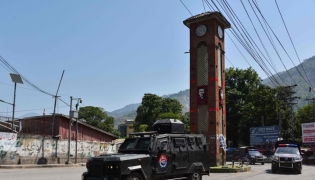 Security personnel patrol a street during Joint Awami Action Committee (JAAC)'s rally, held days after the local government banned the protest group under anti-terror laws in Muzaffarabad, capital of Pakistan-administered Kashmir on June 9, 2026. (Photo by AFP)