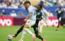 Uruguay's midfielder #20 Maximiliano Araujo and Saudi Arabia's defender #12 Saud Abdulhamid fight for the ball during the 2026 World Cup Group H football match between Saudi Arabia and Uruguay at the Miami Stadium in Miami Gardens on June 15, 2026. (Photo by PATRICIA DE MELO MOREIRA / AFP)

