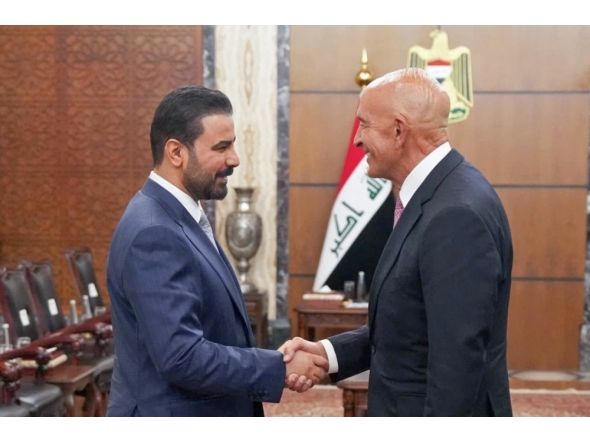 This handout picture released by Iraq's Prime Minister's Media Office shows Iraq's new Prime Minister Ali al-Zaidi (L) meeting with US Special Envoy for Syria and Ambassador to Turkiye Tom Barrack during his visit in Baghdad on June 16, 2026. (Photo by AFP) /