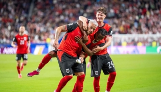 Austria's forward #07 Marko Arnautovic (L), celebrate with Austria's midfielder #17 Carney Chukwuemeka and Austria's midfielder #24 Paul Wanner after scoring a penalty shot during the 2026 World Cup Group J football. Photo by Georg Hochmuth / APA / AFP
