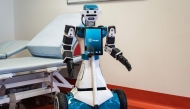 This photograph shows humanoid robot Alter-Ego, designed by the Italian Institute of Technology, at the IRCSS Maugeri hospital in Milan.  (Photo by Marco Bertorello / AFP)