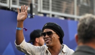 Brazilian former football star Ronaldinho waves ahead of the 2026 World Cup Group C football match between Brazil and Haiti at the Philadelphia Stadium in Philadelphia on June 19, 2026. (Photo by Jewel SAMAD / AFP)