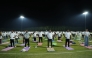 Ambassador of India to Qatar H E Vipul with other participants practising yoga.