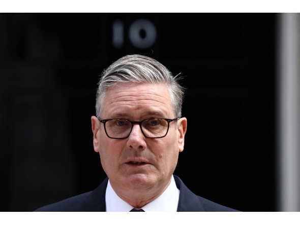Britain's Prime Minister Keir Starmer makes a statement on his future outside 10 Downing Street on the morning of June 22, 2026, in London. Photo by Henry Nicholls / AFP
