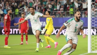 Amine Gouiri #9 of Algeria celebrates scoring his team's second goal during the FIFA World Cup 2026 Group J match between Jordan and Algeria at San Francisco Bay Area Stadium on June 22, 2026 in Santa Clara, California. Stu Forster/Getty Images/AFP 