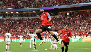 Mohamed Salah celebrates after scoring Egypt's second goal. (AFP)