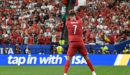 Portugal's forward #07 Cristiano Ronaldo celebrates after scoring the opening goal during the 2026 World Cup Group K football match between Portugal and Uzbekistan at the Houston Stadium in Houston on June 23, 2026. (Photo by RONALDO SCHEMIDT / AFP)