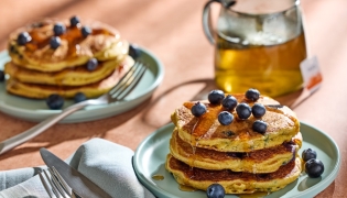 Blueberry Cornmeal Pancakes. (Tom McCorkle/For The Washington Post; food styling by Gina Nistico)
