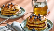 Blueberry Cornmeal Pancakes. (Tom McCorkle/For The Washington Post; food styling by Gina Nistico)
