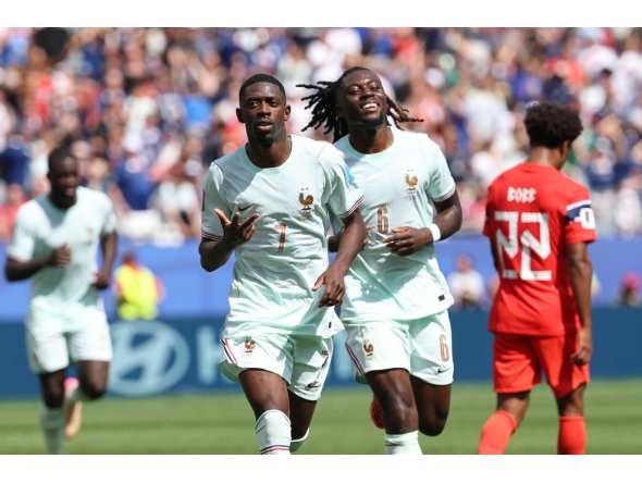 France's forward #07 Ousmane Dembele celebrates scoring his team's third goal with midfielder #06 Manu Kone during the 2026 World Cup Group I football match between Norway and France at the Boston Stadium in Foxborough on June 26, 2026. (Photo by FRANCK FIFE / AFP)