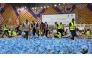 Representatives of QRCS and JHCO preparing vegetable parcels.