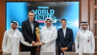Officials pose with the eFIBA World Finals Season 4 trophy during a press conference in Doha, yesterday.