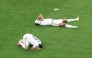 Saudi Arabia's Abdulelah Al-Amri and Ali Lajami react after being eliminated following the 0-0 draw with Cape Verde.