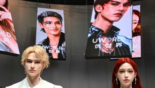 Humanoid robots are displayed during the launch of the U1 humanoid robot produced by UWORLD, a brand under UBTECH Robotics on June 30, 2026. (Photo by Adek Berry / AFP)