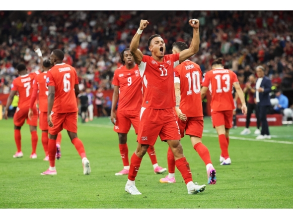 Dan Ndoye #11 of Switzerland celebrates scoring his team's second goal. Alex Grimm/Getty Images/AFP