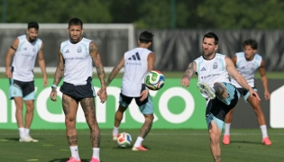 Argentina’s Lionel Messi (right) takes part in a training session with teammates. (AFP)