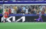 Egypt's forward #10 Mohamed Salah (L) shoots and scores past Australia's goalkeeper #01 Mathew Ryan in a penalty shoot-out during the 2026 World Cup round of 32 football match between Australia and Egypt at the Dallas Stadium in Arlington on July 3, 2026. (Photo by Thomas COEX / AFP)