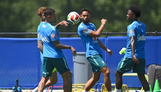 Brazil’s Matheus Cunha (centre) and Vinicius Junior (right) take part in a training session with teammates. (PICS AFP)