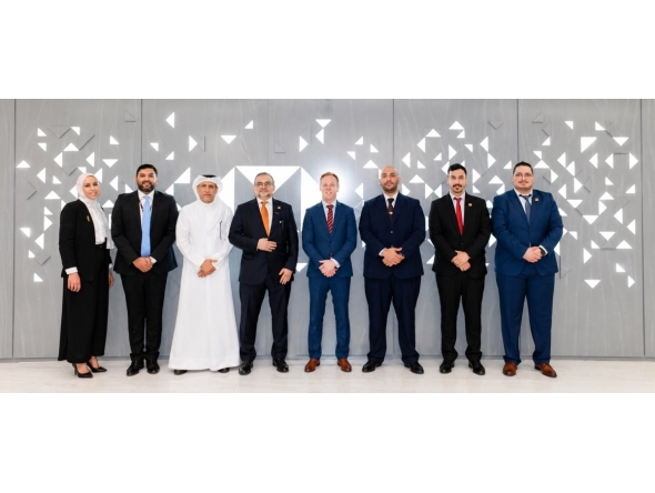 Chief Executive Officer, Qatar, HSBC Bank Middle East Limited, Abdul Hakeem Mostafawi and Chief Executive Officer, Noqoody, Nayef Rashwan pose for a group photo with other officials.