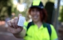 A picture taken on July 6, 2026 in Barcelona shows a gardener's wristband containing a sensor that detects body temperature. (Photo by Josep Lago / AFP)
