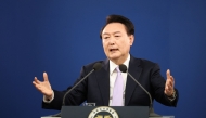(Files) South Korean President Yoon Suk Yeol answers a reporter's question during a press conference at the Presidential Office in Seoul on November 7, 2024. (Photo by Kim Hong-Ji / Pool / AFP)