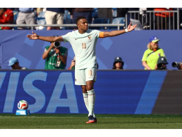 France's forward #10 Kylian Mbappe celebrates scoring his team's first goal during the 2026 World Cup football tournament quarter-final match between France and Morocco at Boston Stadium in Foxborough on July 9, 2026. (Photo by CHARLY TRIBALLEAU / AFP)
