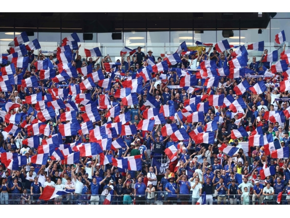 France fans cheer for their team during the 2026 World Cup football tournament quarter-final at Boston Stadium in Foxborough on July 9, 2026. (Photo by Charly Triballeau / AFP)