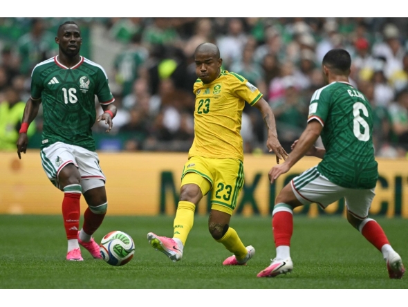 Mexico's forward #16 Julian Quinones, South Africa's midfielder #23 Jayden Adams and Mexico's midfielder #06 Erik Lira during the 2026 World Cup Group A football match between Mexico and South Africa at the Mexico City Stadium in Mexico City on June 11, 2026. Photo by CARL DE SOUZA / AFP