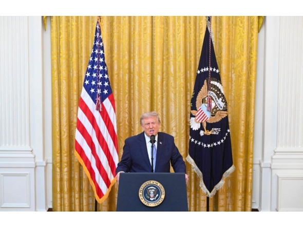 US President Donald Trump addresses the nation from the East Room of the White House in Washington, DC on July 16, 2026. (Photo by Saul Loeb / Pool / AFP)