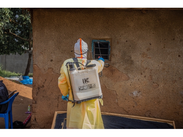 A medical worker performs disinfection before burying a deceased person infected with the Ebola virus in Bunia, the capital of Ituri Province in the Democratic Republic of the Congo, July 9, 2026. (Xinhua)