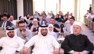 Qatari delegation with other officials during the event.