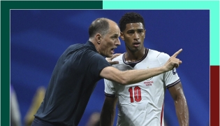England coach Thomas Tuchel speaks with Jude Bellingham during the semi-final against Argentina. 