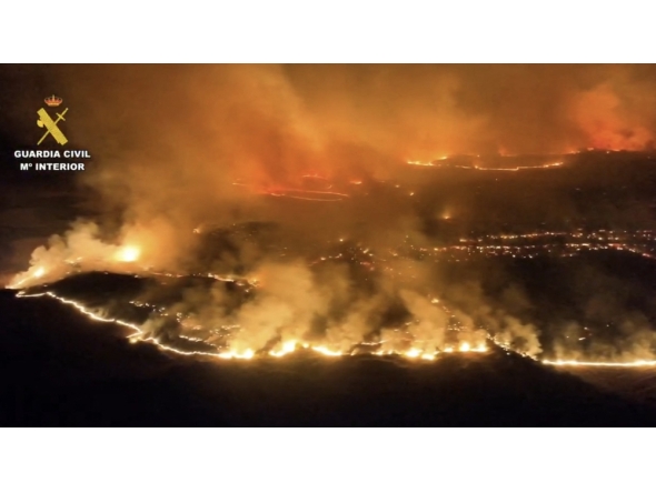 This screen grab taken from handout aerial video footage released on July 18, 2026 by Spain's Pegaso unit of the Guardia Civil shows a massive wildfire, in Cinco Villas area, near Zaragoza, in a sparsely populated part of the Aragon region in northeastern Spain. (Photo by Handout / Spanish Guardia Civil / AFP)