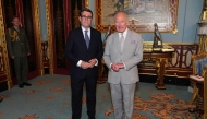 King Charles Britain's King Charles III poses with Britain's incoming Prime Minister Andy Burnham on July 20, 2026 (Photo by Aaron Chown / Pool / AFP)