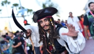 A Jack Sparrow pirate cosplayer poses outside the Convention Center during Comic Con International in San Diego on July 23, 2026. (Photo by Chris Delmas / AFP)
