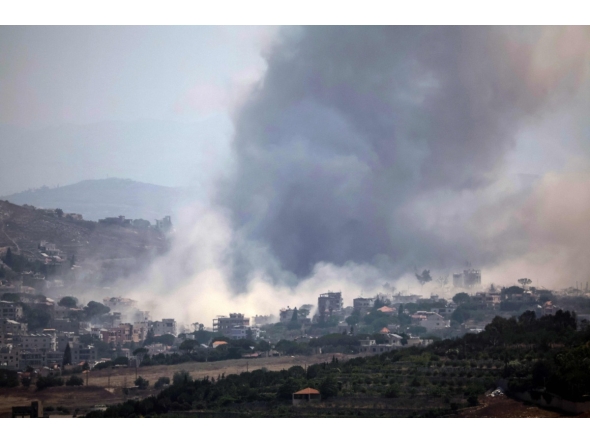 This image taken from the vicinity of the village Zawtar al-Sharqiyah in southern Lebanon, shows smoke rising from the site of an explosion carried out by the Israeli military, in the village of Kfar Tibnit on July 23, 2026. (Photo by ibrahim AMRO / AFP) /