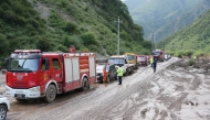 Rescuers arrive at the flood-hit scenic area in Weiyuan County, northwest China's Gansu Province, July 26, 2026. (Photo by Zhou Qiong/Xinhua)