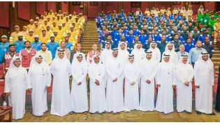 Officials with workers during the event.
