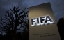 This photo taken on October 8, 2015 in Zurich shows the entrance sign with the logo at the FIFA world headquarters. Photo by Fabrice COFFRINI / AFP