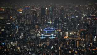 Buildings and apartments are seen in the evening in Tokyo on August 1, 2026. File photo.