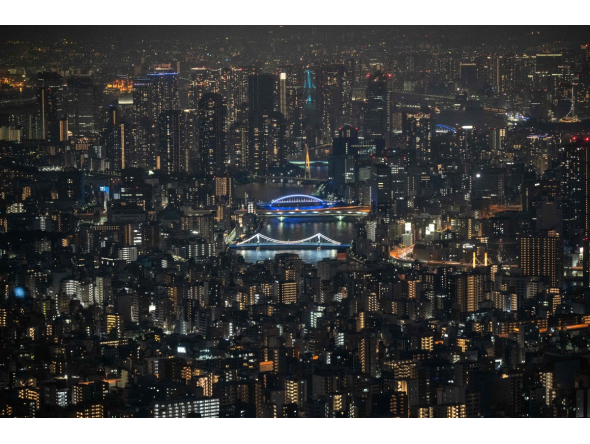 Buildings and apartments are seen in the evening in Tokyo on August 1, 2026. File photo.