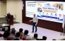 An official speaking during an awareness and training workshop.