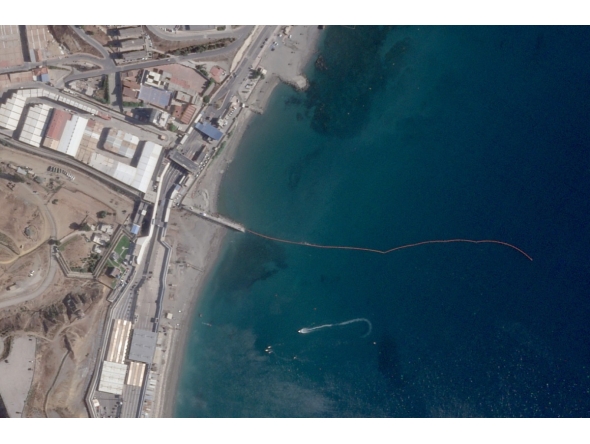 This handout satellite photograph, taken on August 2, 2026, and released by Planet Labs PBC, shows the waterline marking the Spain-Morocco maritime border off Spain's North African enclave of Ceuta. Photo by Handout / 2026 Planet Labs PBC / AFP