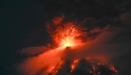 The Fuego volcano erupts 65 kilometers southwest of Guatemala City on August 3, 2026. (Photo by Johan ORDONEZ / AFP)
