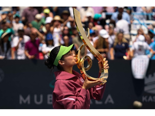 Alexandra Eala of the Philippines kisses the Championship Trophy after winning the women's singles championship match against Jessica Pegula of the United States on the final day of the Mubadala DC Open 2026 at William H.G. FitzGerald Tennis Center on August 3, 2026 in Washington, DC. Scott Taetsch/Getty Images/AFP 