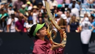 Alexandra Eala of the Philippines kisses the Championship Trophy after winning the women's singles championship match against Jessica Pegula of the United States on the final day of the Mubadala DC Open 2026 at William H.G. FitzGerald Tennis Center on August 3, 2026 in Washington, DC. Scott Taetsch/Getty Images/AFP 