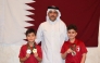 Qatar Chess Association Executive Director Hamad Al Tamimi with Mohammed Jarbi and Khalid Al Jumaat.