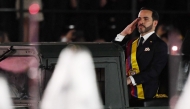 Colombia's new President Abelardo de la Espriella rides in a military vehicle while reviewing troops during a change-of-command ceremony at the Pichincha Battalion following his inauguration in Cali, Colombia, on August 7, 2026. (Photo by Jaime SALDARRIAGA / AFP)